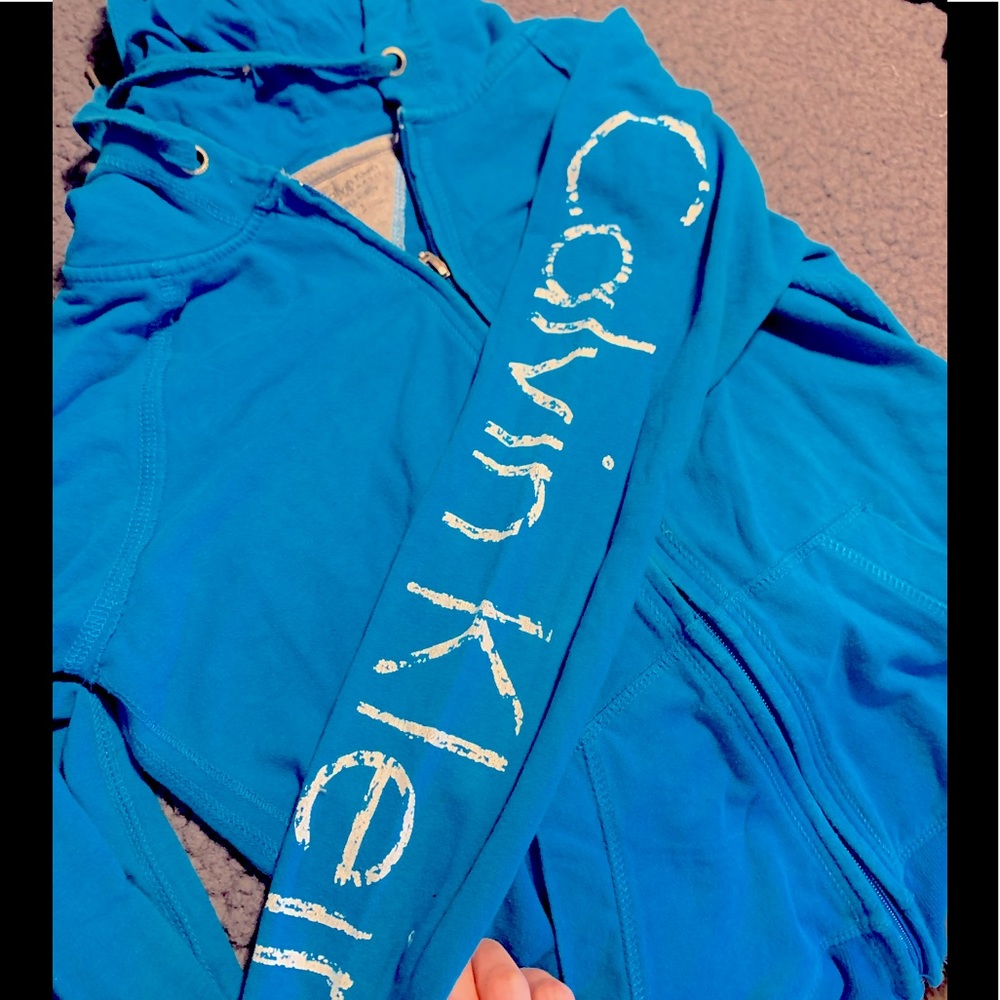 Calvin Klein blue performance zip up hoodie with thumb holes